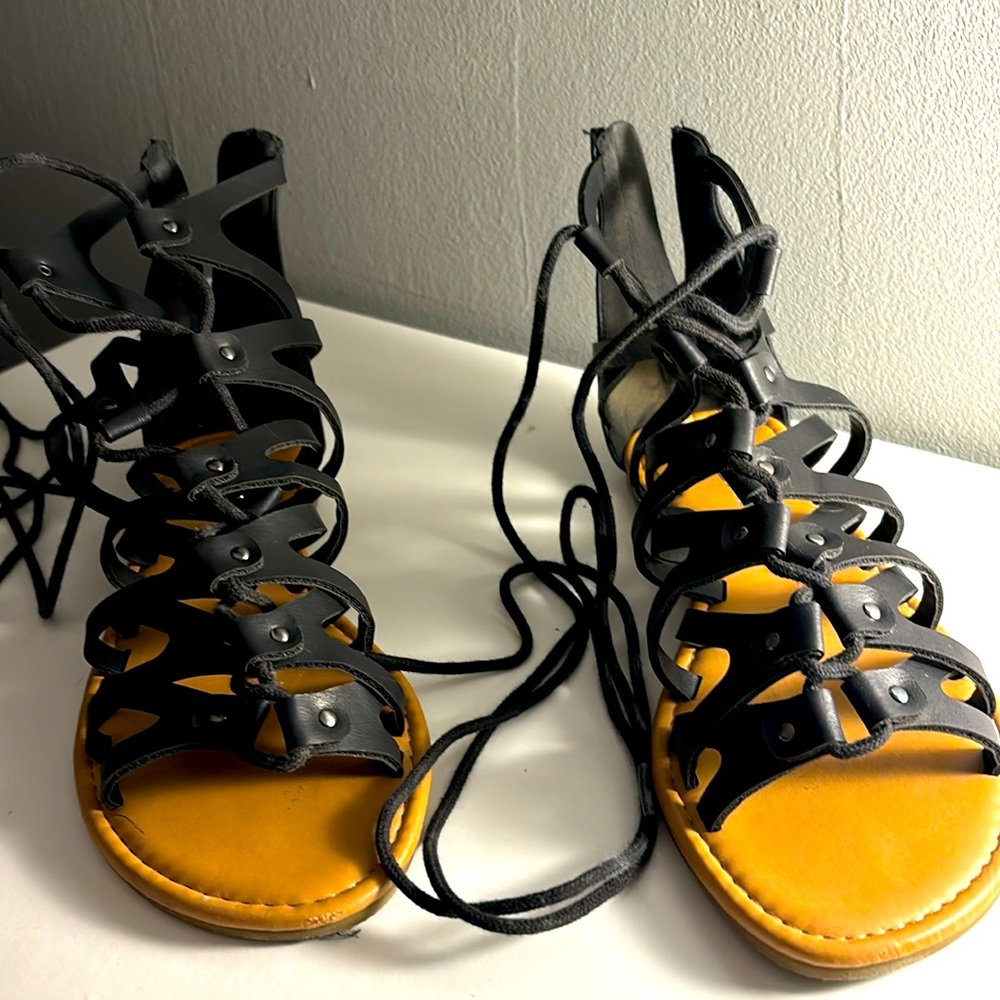 Tie up sandals by soda
